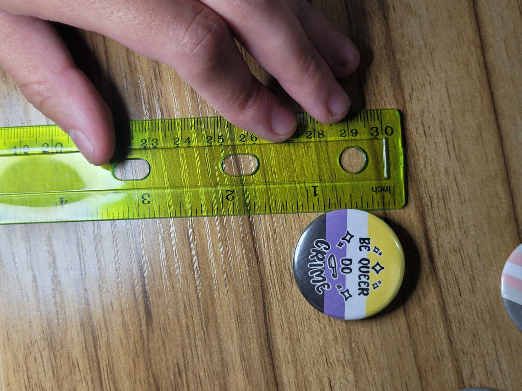 Be Queer Do Crime 1.25" Button Pin